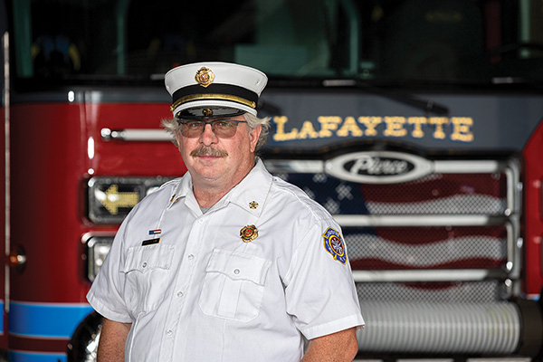 Chief for Lafayette New York in Front of Pierce Fire Truck