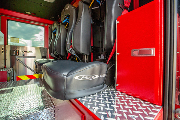 Interior crew cab with three fire truck passenger seats of fire truck