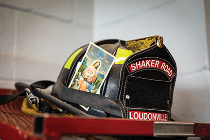 Loudonville Fire Department firefighter helmet on top fire station locker