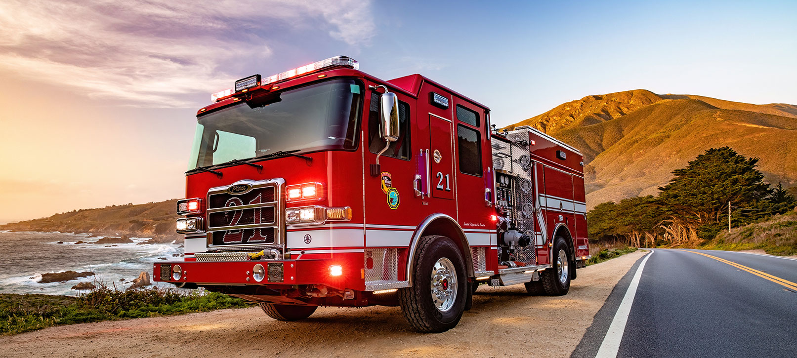 Pierce Fire Truck parked on the side of the road near the ocean with a TAK-4® Independent Front Suspension System. 